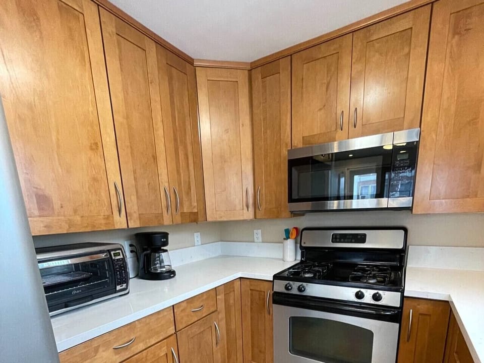 Equipped with Toaster Oven and Coffee Maker.