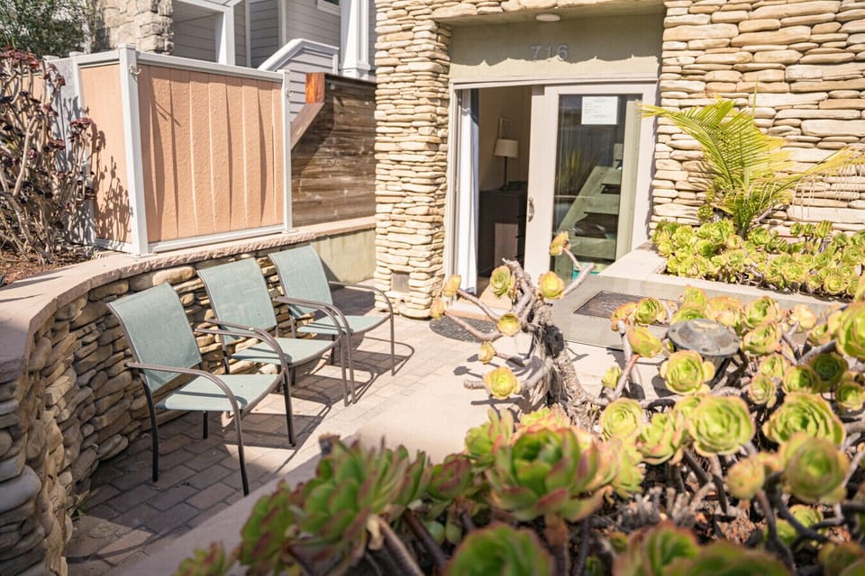 Patio can be accessed through the bottom floor room or from the side gate.