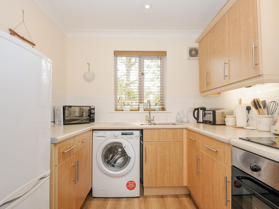 Fridge, electric kettle, toaster, cookware/dishes/utensils