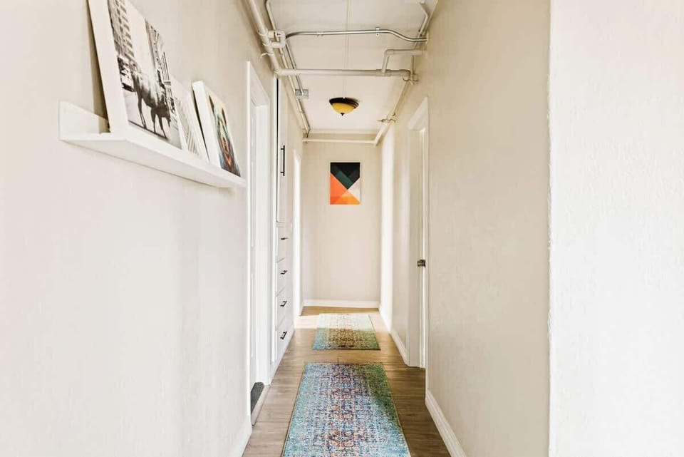 Hallway leading to second bedroom and bathroom