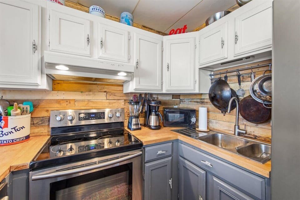 With Stainless Steel Appliances and all the Luxuries of Home, this Kitchen is sure to be a Chef's Dream.
