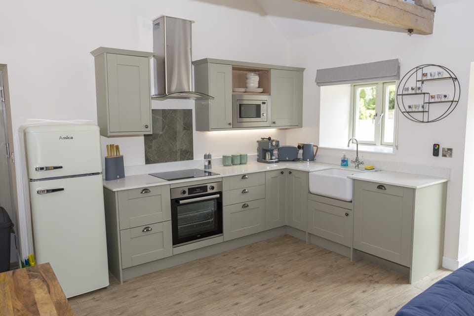 Well equipped kitchen with dishwasher and espresso machine