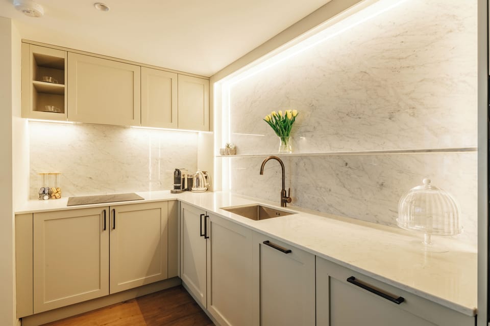 Fully equipped kitchen with modern integrated appliances.