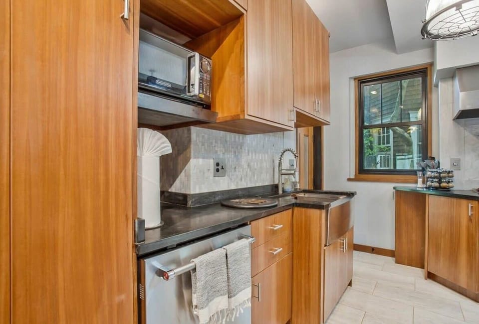 Kitchen with custom cabinets and granite countertop