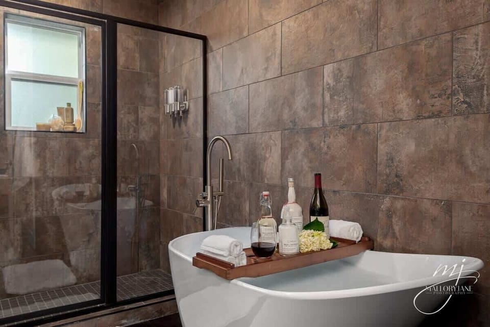 Bright bathroom with walk‑in shower and modern fixtures keeps the whole group comfortable.