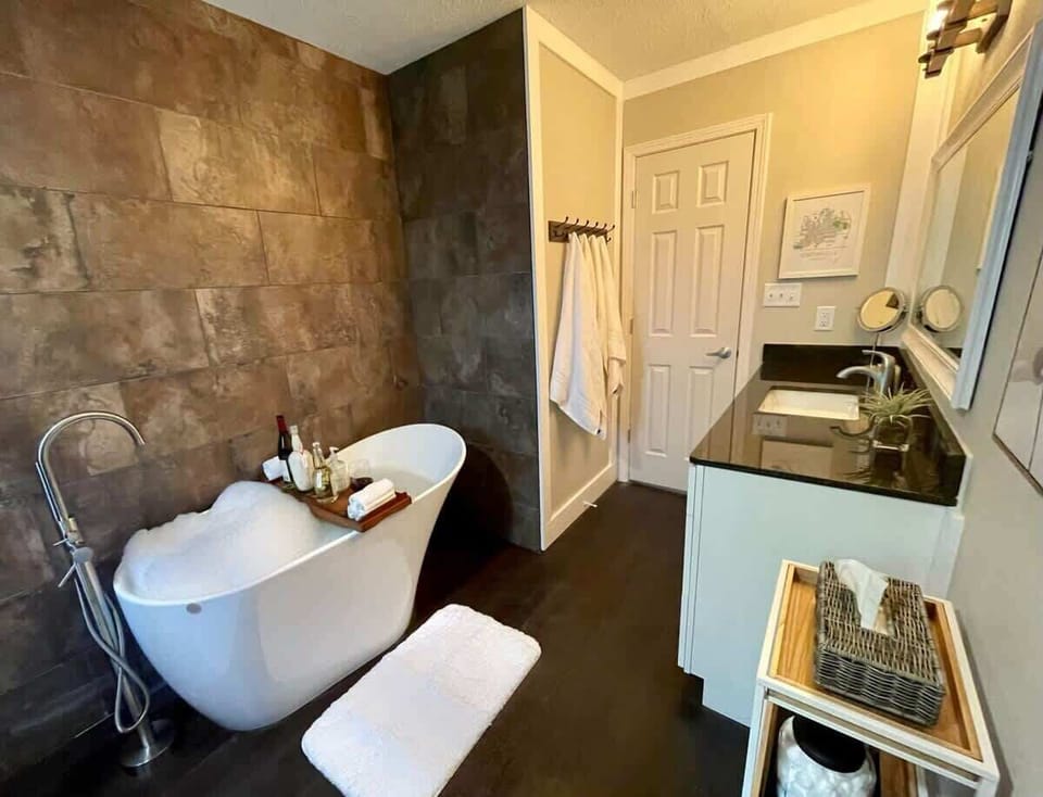 Convenient bath near living space keeps gatherings effortless.