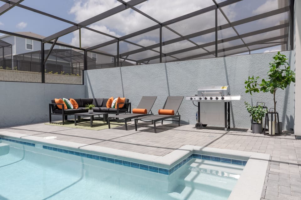 This idyllic pool area provides the perfect escape for relaxation and fun.