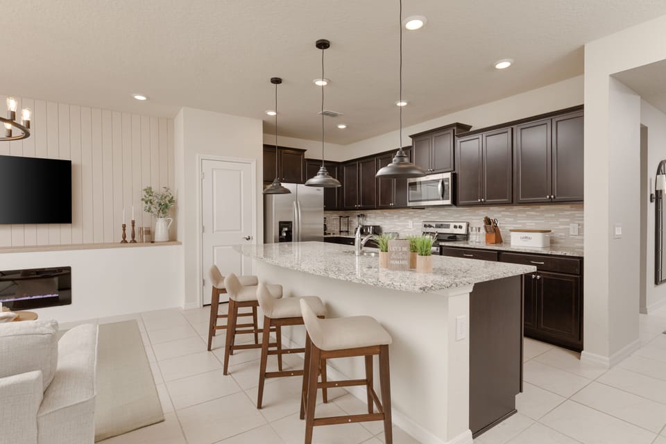 The centerpiece is the expansive island