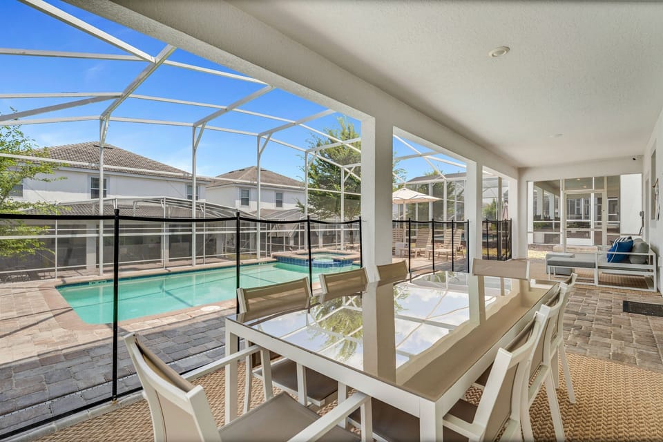 Entertain in the outdoor lanai while watching the kids swim