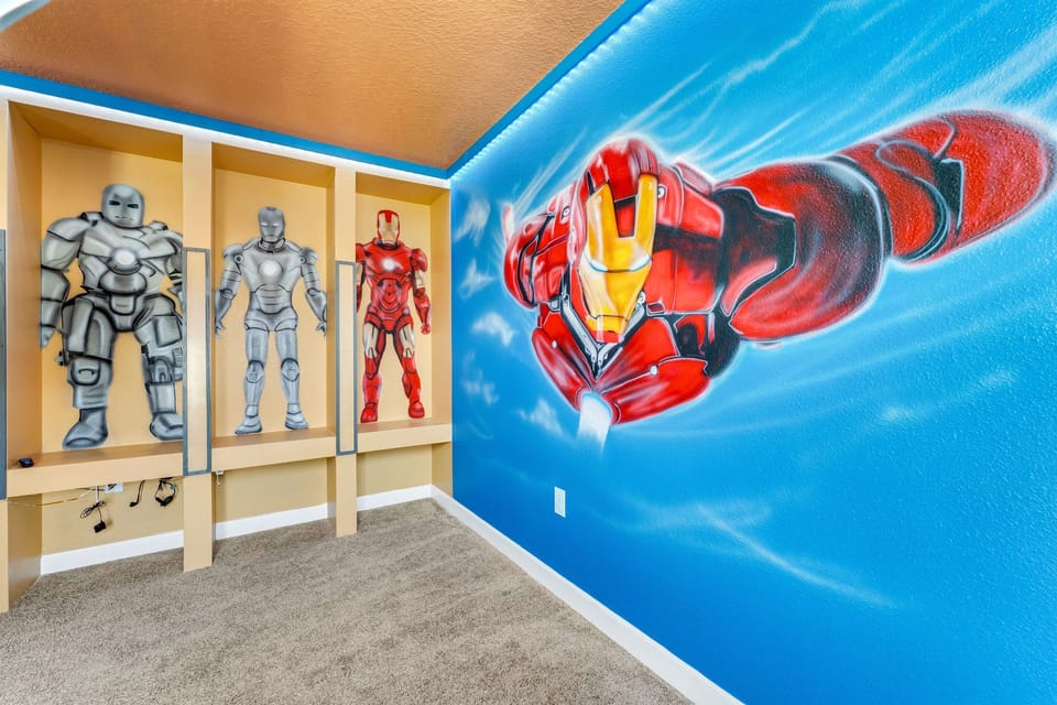 This room has 4 twin bunk beds and plenty of lounge space from which to watch their favorite shows.