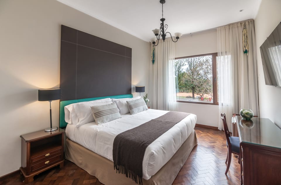 Standard Room, Garden View | In-room safe, desk, laptop workspace, blackout drapes