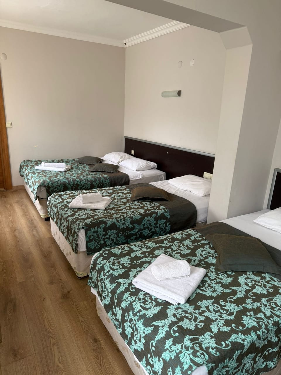 Family Quadruple Room | Minibar, iron/ironing board, WiFi