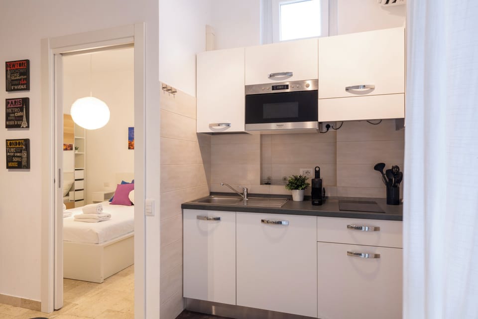 City Apartment | Private kitchen | Full-size fridge, microwave, stovetop, espresso maker