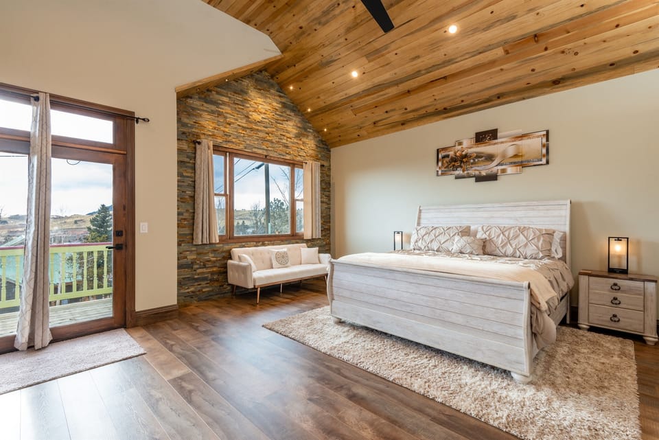 Enjoy mountain views and access the deck from the bedroom