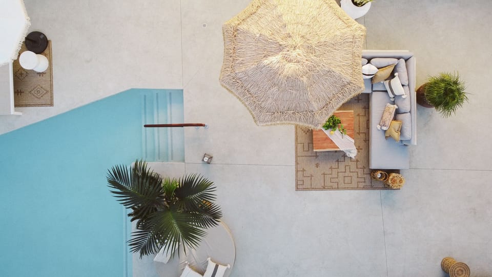 Outdoor pool, open 8:00 AM to 10:00 PM, free cabanas, pool umbrellas