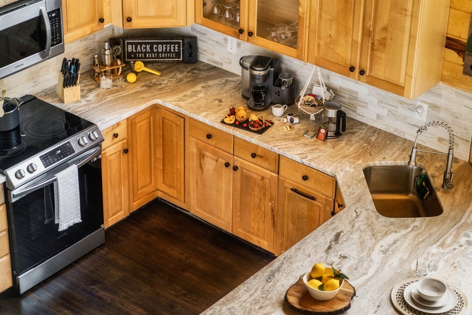 Cooking is a pleasure in this space with plenty of counter space to prepare your meals. Find all the pots, baking pans and serving dishes you will need.