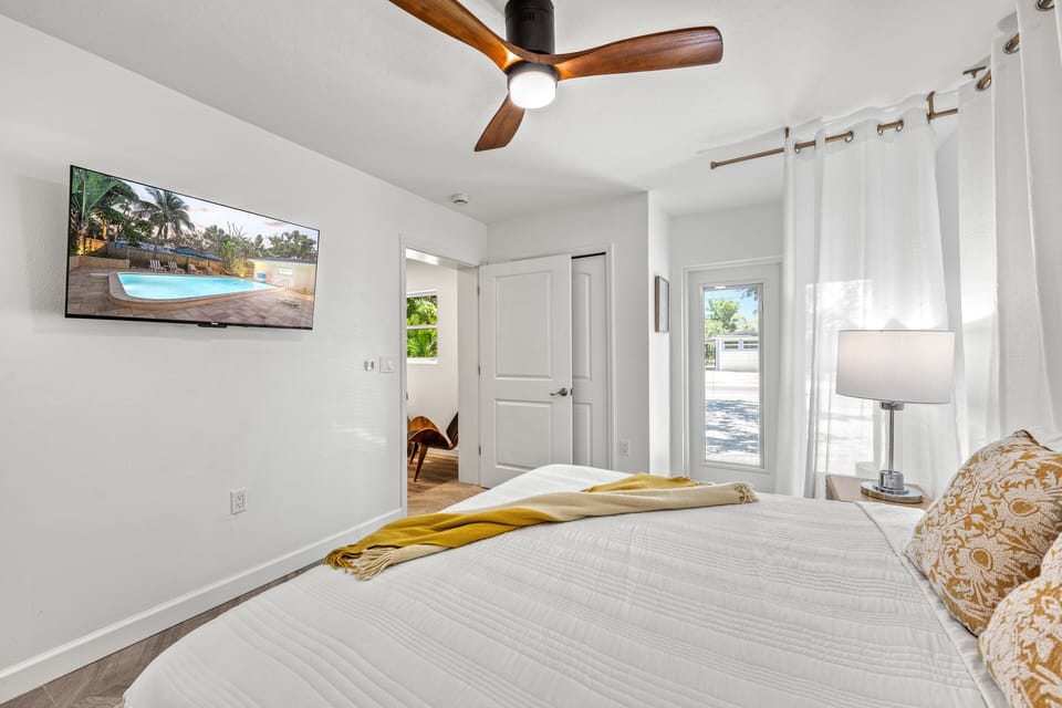 Bedroom 1. Unwind in the second king bedroom, complete with soft linens, and a tranquil color palette and ensuite.