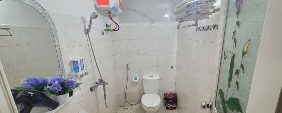 Shower, rainfall showerhead, designer toiletries, hair dryer