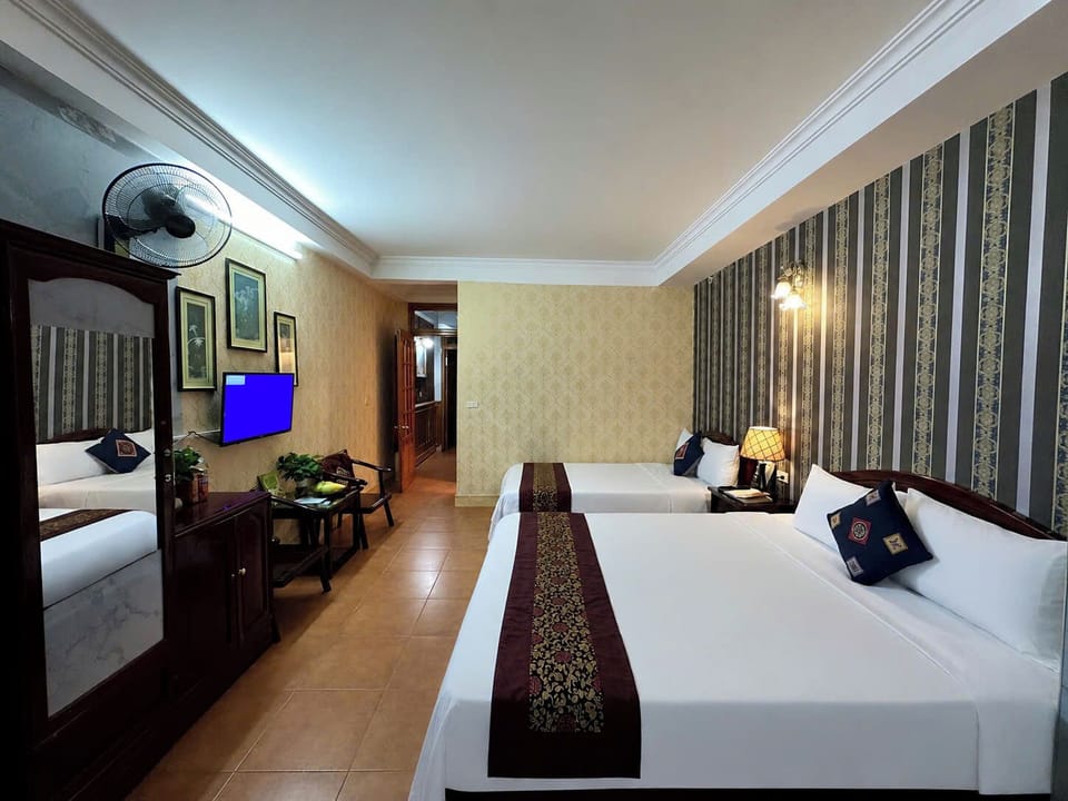 Desk, laptop workspace, free WiFi, bed sheets