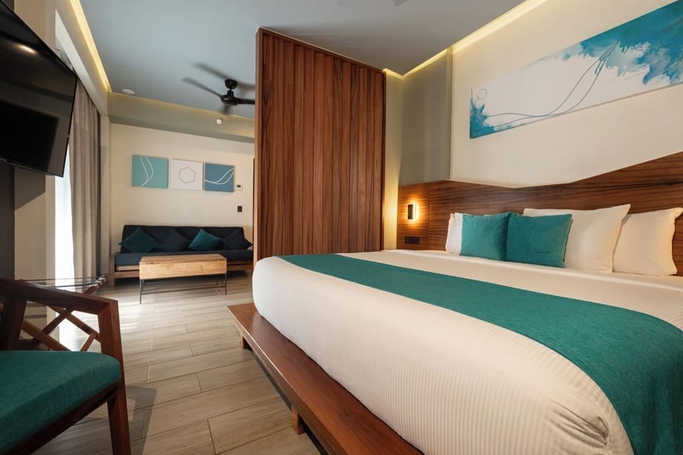 Junior Suite Partial Lagoon View | 1 bedroom, premium bedding, Tempur-Pedic beds, minibar