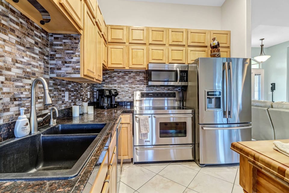 Upgraded appliances, all cookware, dinnerware and many kitchen tools make this kitchen easy to use during your stay.