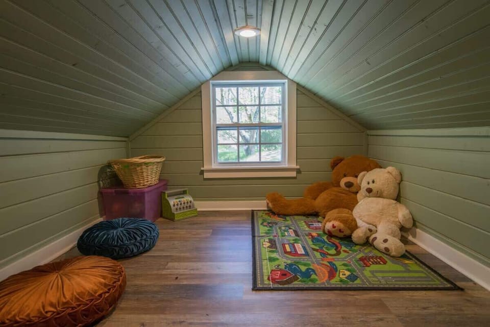 In the attic's cozy nooks, children create their own stories, turning it into a captivating play zone.