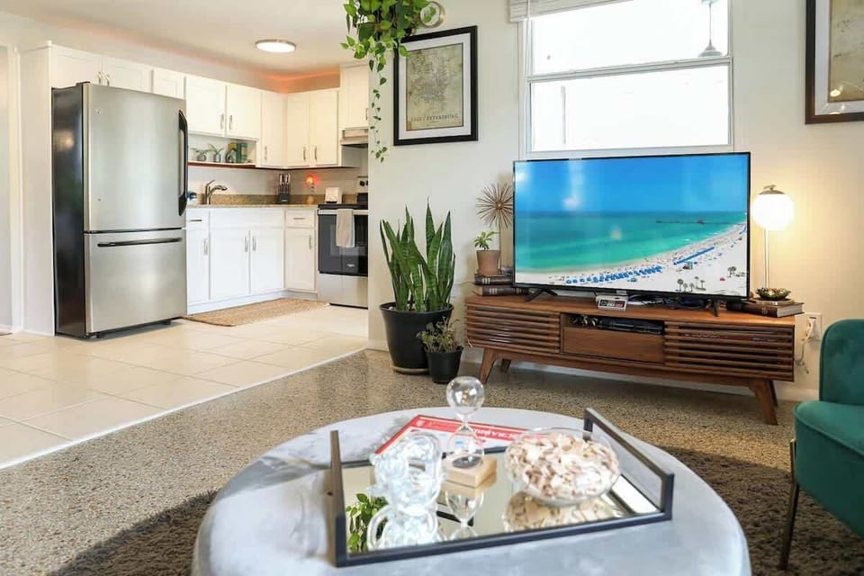 Living room and kitchen area in Mystic Haven vacation rental in Largo, Florida.