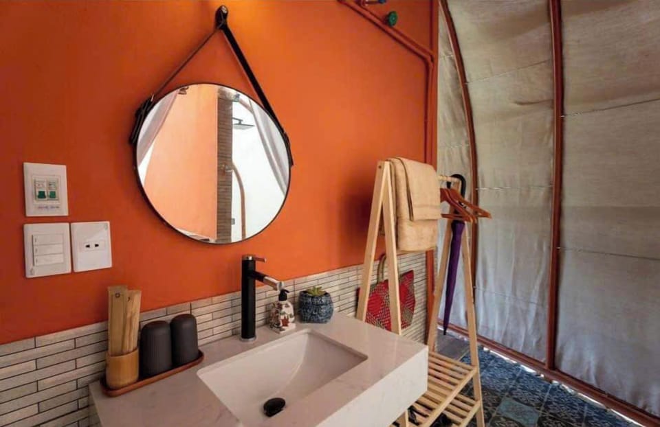 Bungalow | Bathroom | Designer toiletries, hair dryer, slippers, bidet