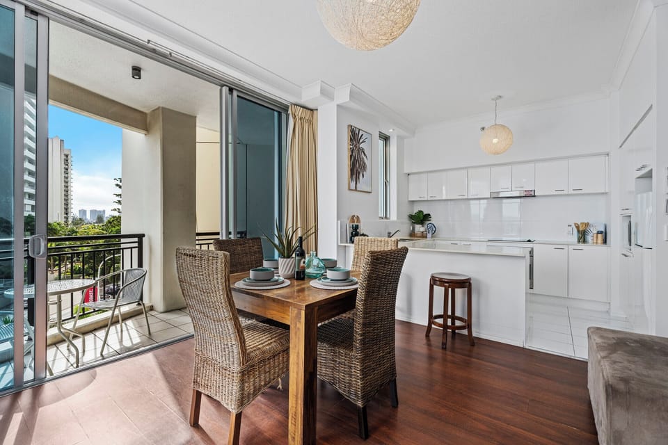 Dining area is right next to the balcony and the kitchen