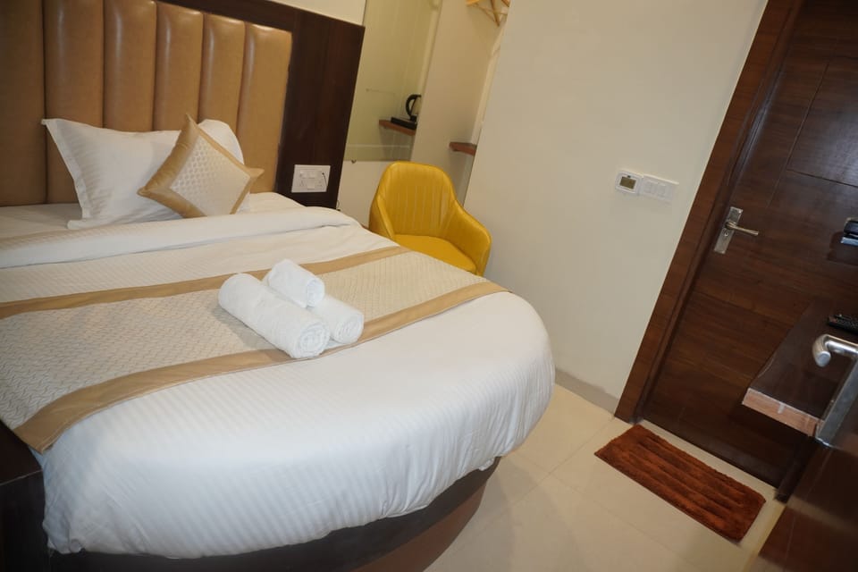 Hypo-allergenic bedding, memory foam beds, free minibar items, desk