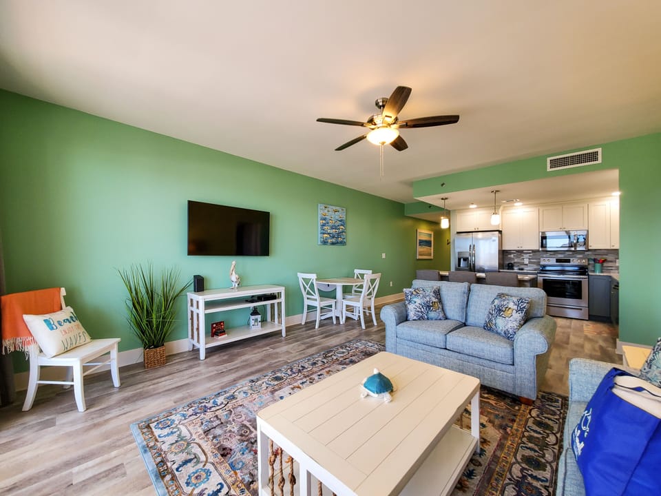 Condo, Multiple Beds, Balcony, Ocean View (Laketown Wharf 911) | Living area | 40-inch TV with digital channels