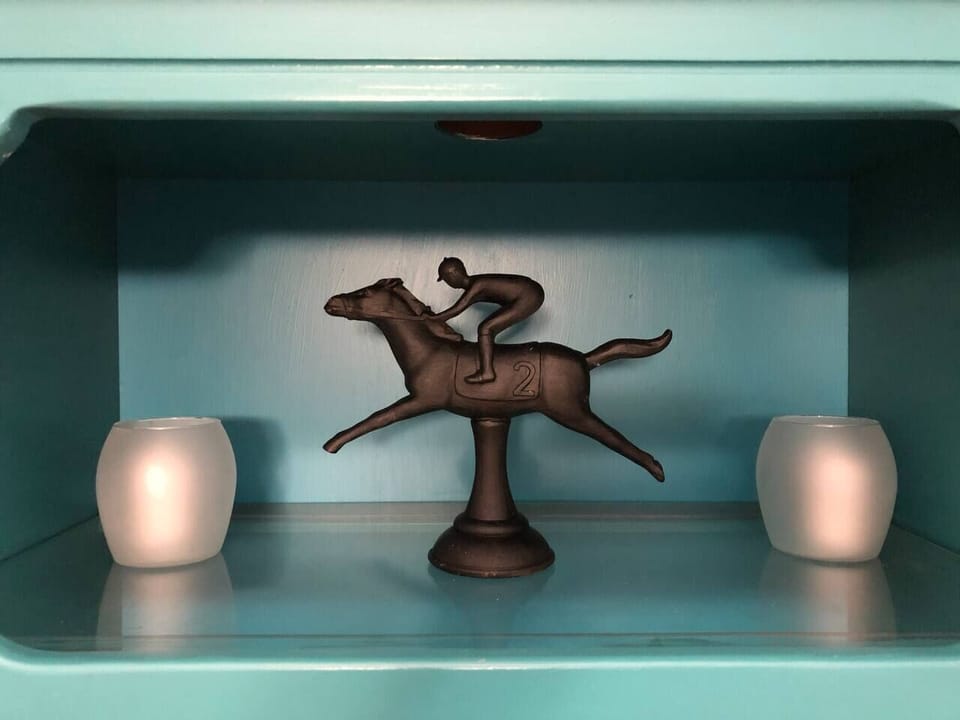 Equestrian art throughout.
