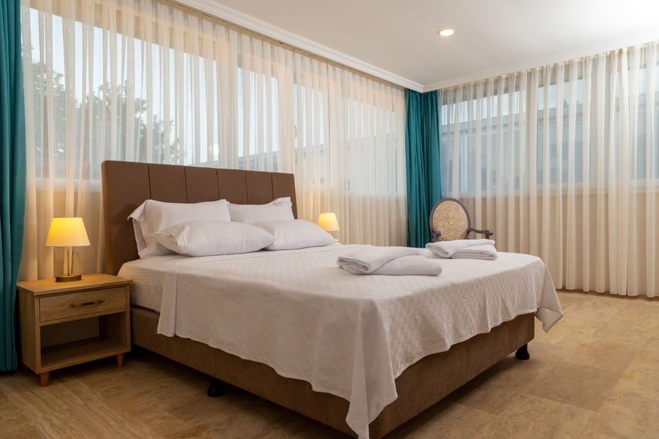 Standard Quadruple Room | Premium bedding, minibar, in-room safe, desk
