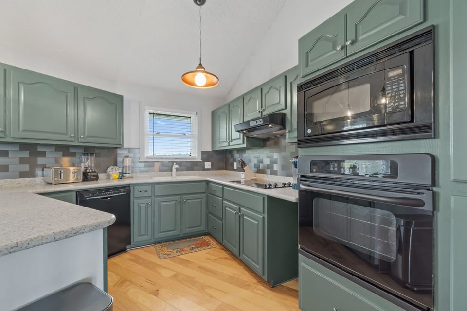 Modern appliances are waiting for you in this spacious kitchen