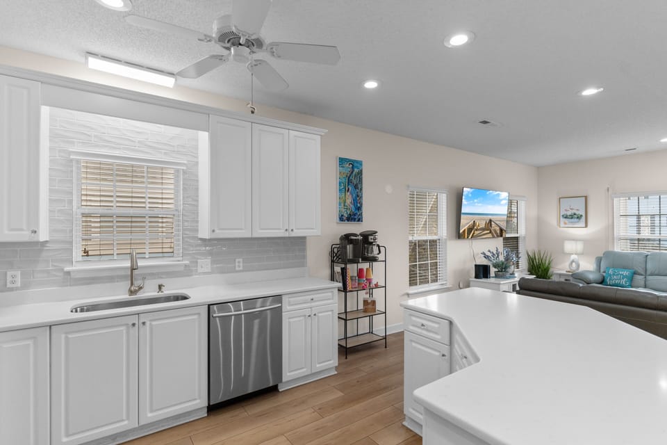 Your bright, modern kitchen flows seamlessly into the cozy living space, perfect for cooking meals while staying connected with family and friends.