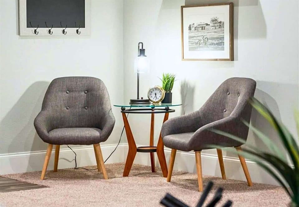 [Living Area] Grab a Book and Take a Seat in the Private Corner, Perfect for Relaxing on a Busy Vacation.
