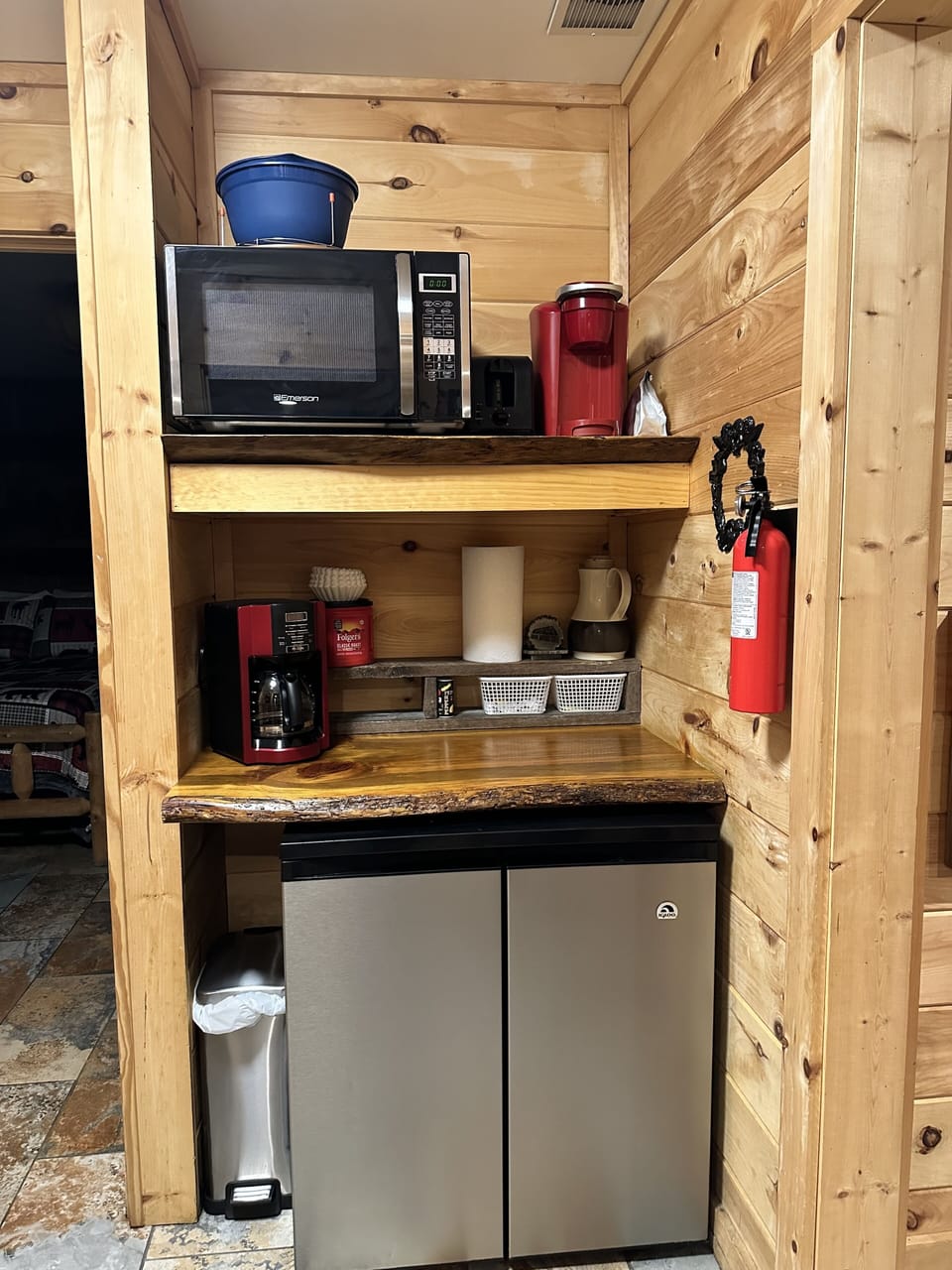Fridge, microwave, electric griddle, crock pot, coffee pot and Keurig.