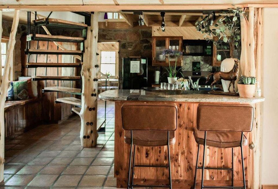 Feel the cool Saltillo tile under your feet as you enjoy cooking with views and experience a large center island for all your cooking needs.