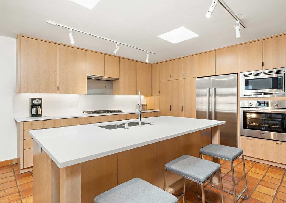 Kitchen with built-in appliances