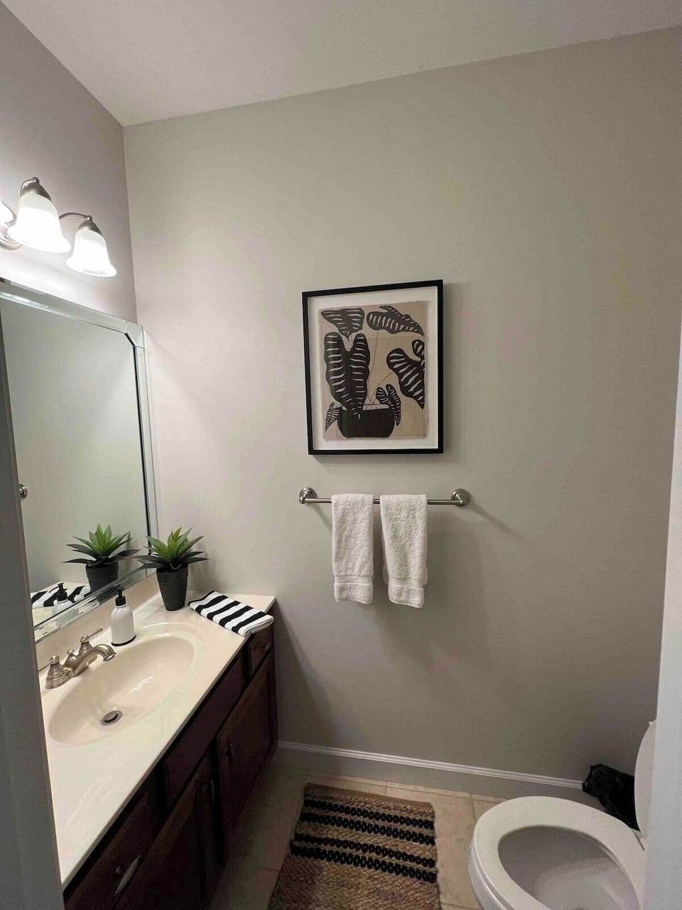 Half bathroom off of kitchen area on main level.