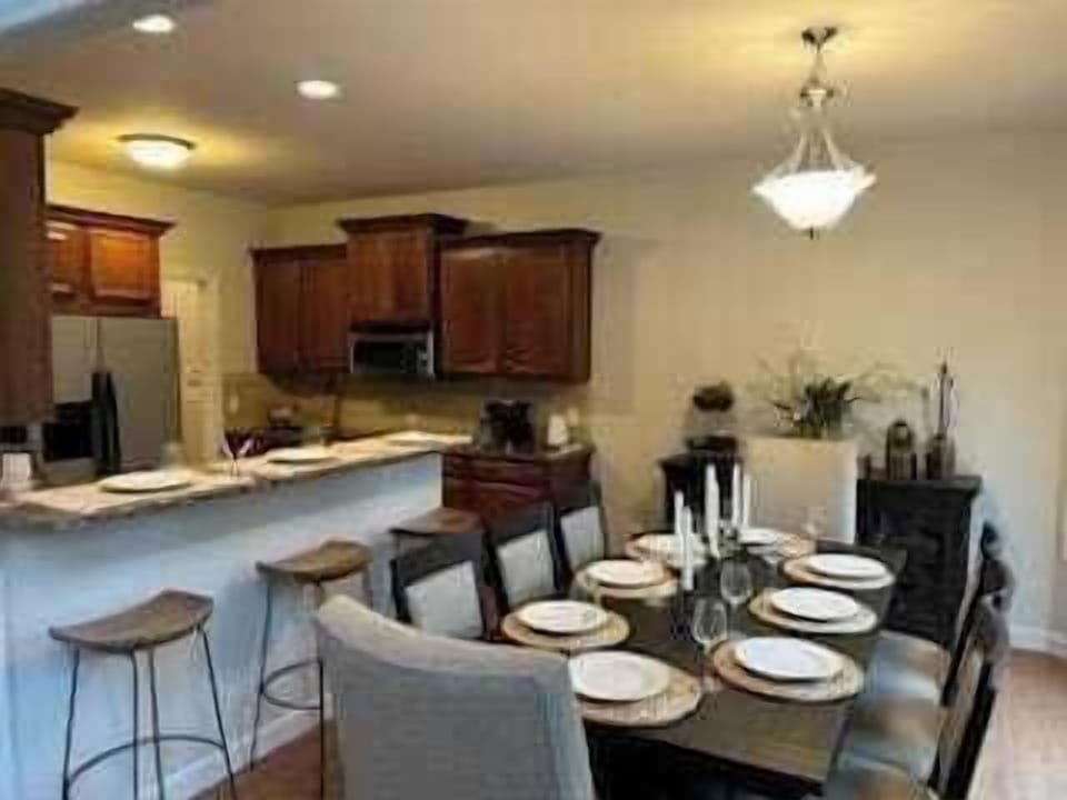 This table can be expanded to seat 12, when pulling the bench from the living room to the table.