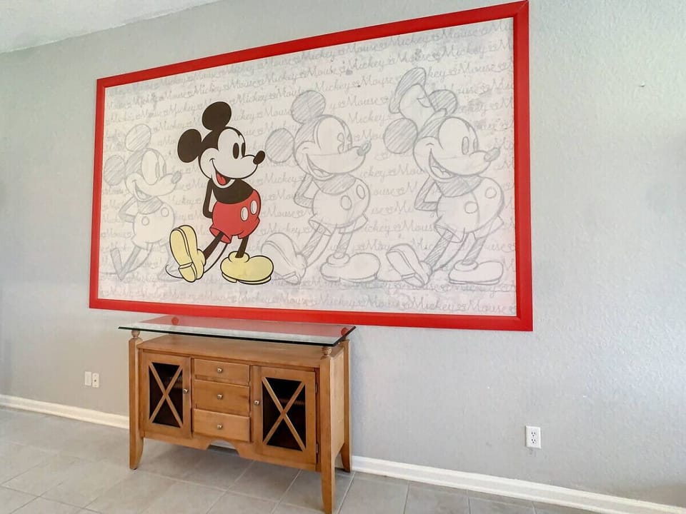 Mickey-designed wall decor adds a playful touch to the space!