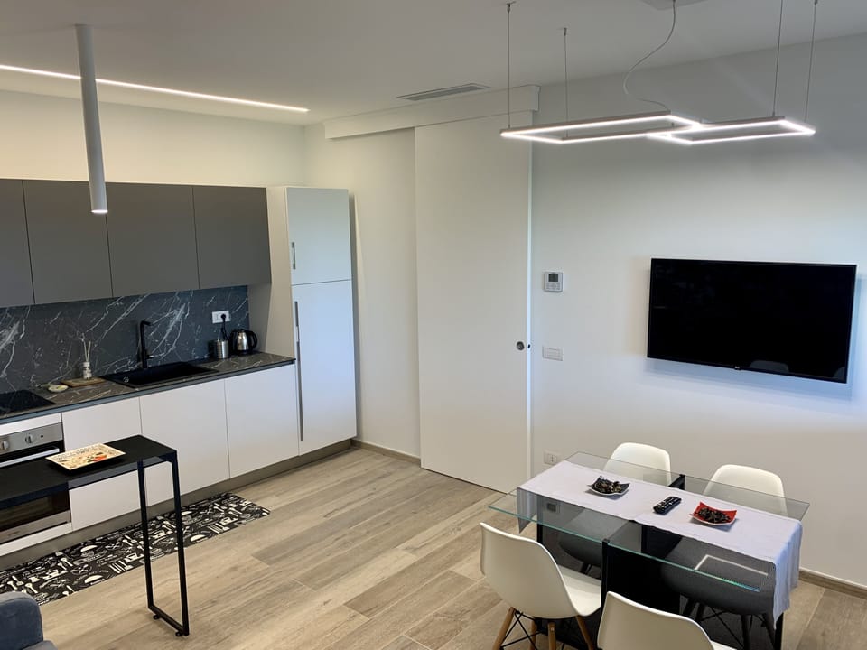 Deluxe Suite, Sea View | Living area | LCD TV