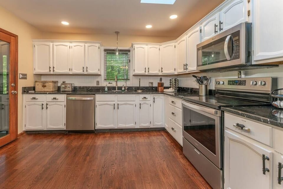 Fully Stocked Kitchen  w/ Breakfast Table, Refrigerator, Microwave, Oven, Stove, Dishwasher, Sink, Coffee Maker, Cooking Utensils and Much More