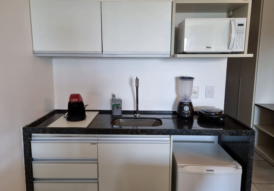 Comfort Apartment | Private kitchen | Microwave, blender, cookware/dishes/utensils