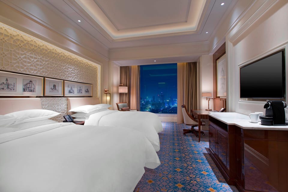 Down comforters, pillowtop beds, minibar, in-room safe