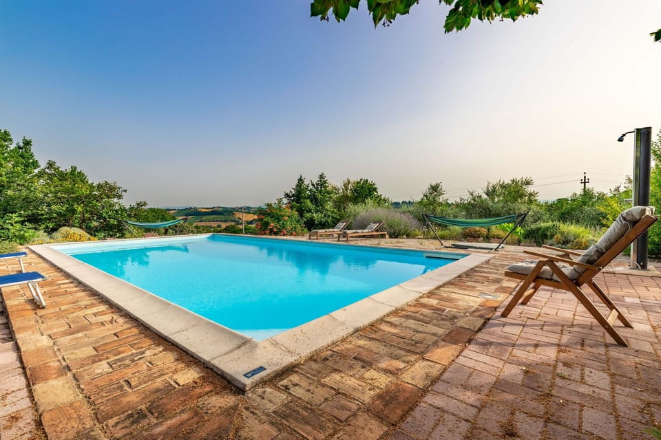 Water, Sky, Plant, Building, Property, Swimming Pool, Azure, Tree, Shade, Rectangle