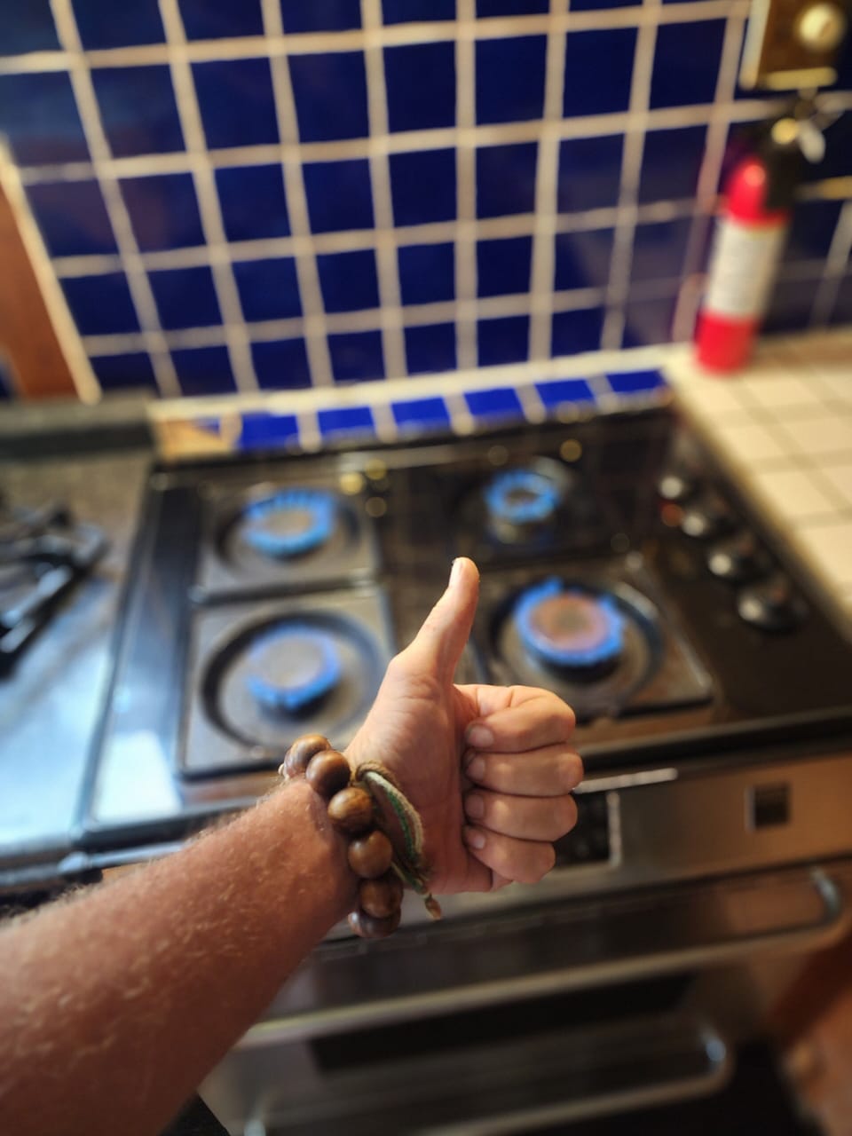 front right burner requires provided long stem lighter to ignite. Stove is old