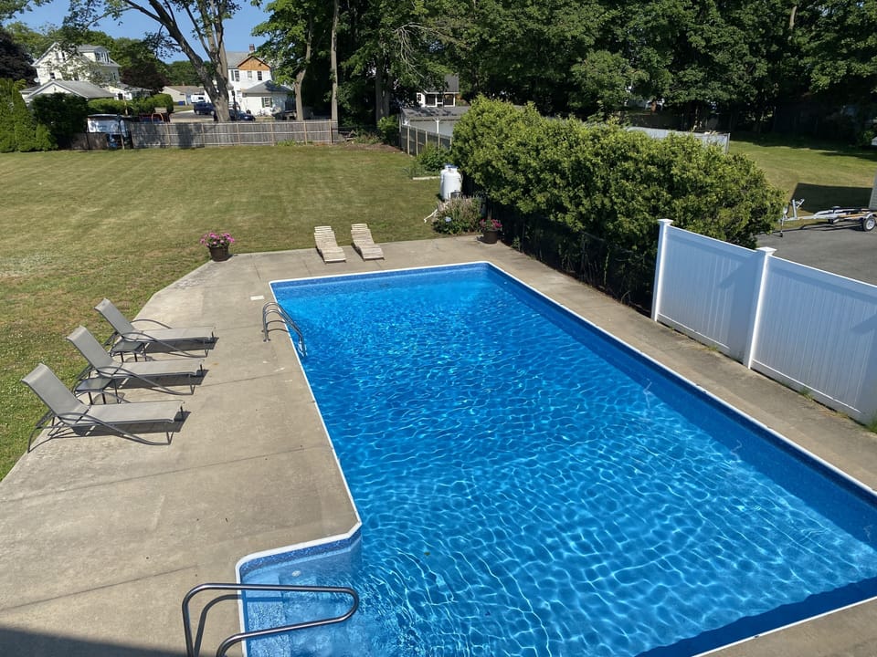 View of the private in-ground pool from primary suite balcony.
