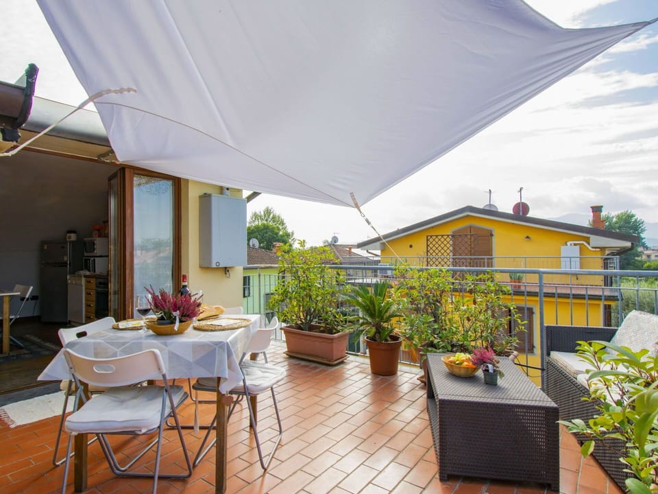 Table, Furniture, Plant, Chair, Building, Flowerpot, Sky, Shade, Outdoor Furniture, Architecture